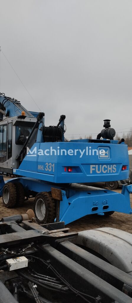 Fuchs MHL 331 Baggerlader