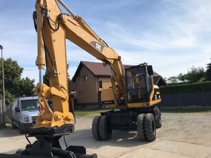 CATERPILLAR M318 B with quick coupler and grading bucket / 315, 316, 318 Mobilbagger
