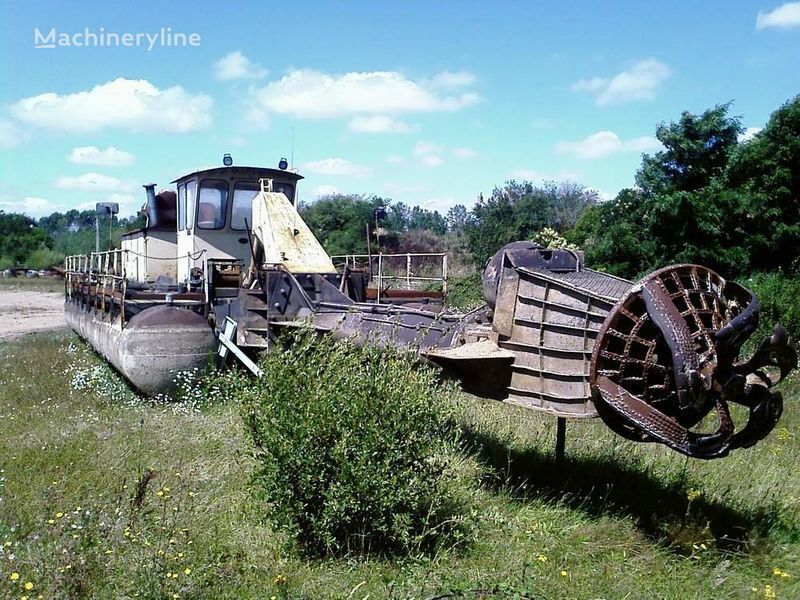 defekter Caterpillar Caterpillar / warmann Schwimmbagger